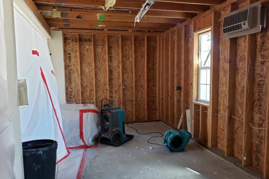 Professional water damage restoration in progress